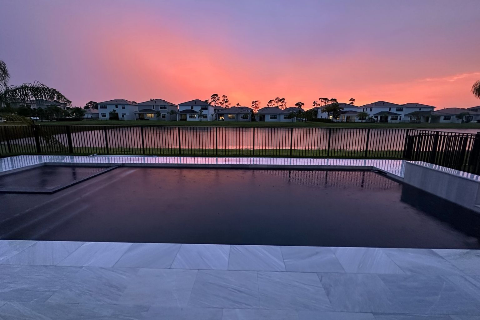 user-inserted infinity pool sunset